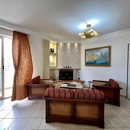 Es-tirana Center *