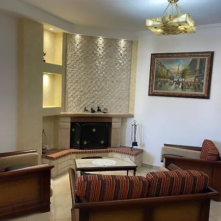 Es-tirana Center *
